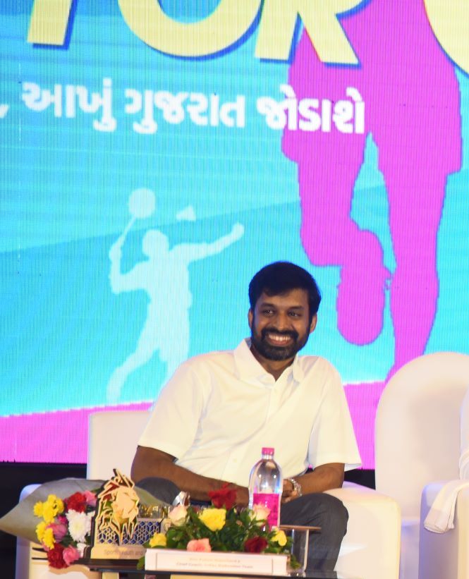 Gujarat chief minister Shri Bhupendrabhai Patel with Indian badminton coach Pullela Gopichand and shooting star Anjali Bhagwat during the #GoForGold event held in Gandhi Nagar on Tuesday.JPG