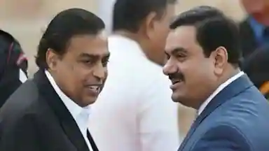 mukesh_ambani_and_gautam_adani_1645706940.webp