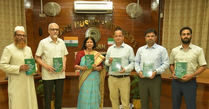 VC Prof Naima Khatoon with Prof Sadaf Zaidi Prof. Akram A. Khan, Dr. Z R A A Azad, Mr. Pir Mohammad Junaid, releasing the book Microbial Biotechnology in the Food Industry.JPG